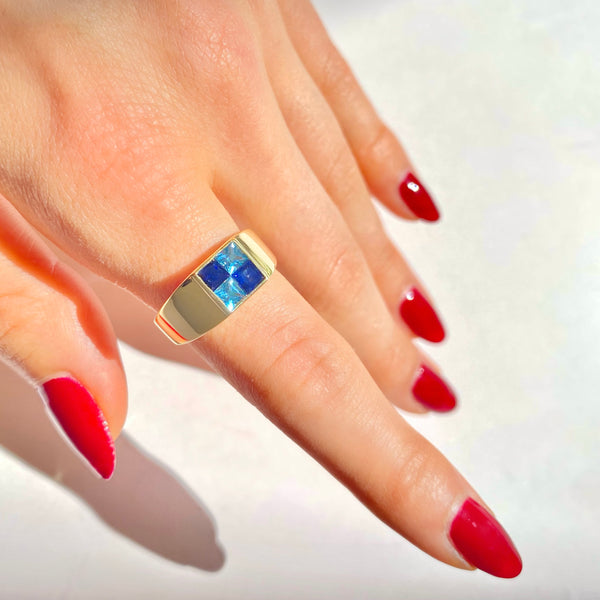 picture of midnight blues ring on finger